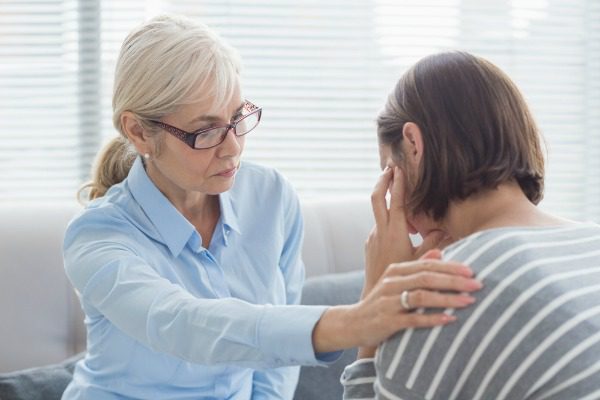 Female counselor with patient