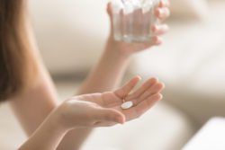 woman taking lorazepam drug