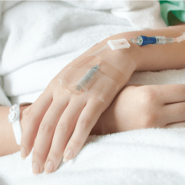 Woman's hand with IV line